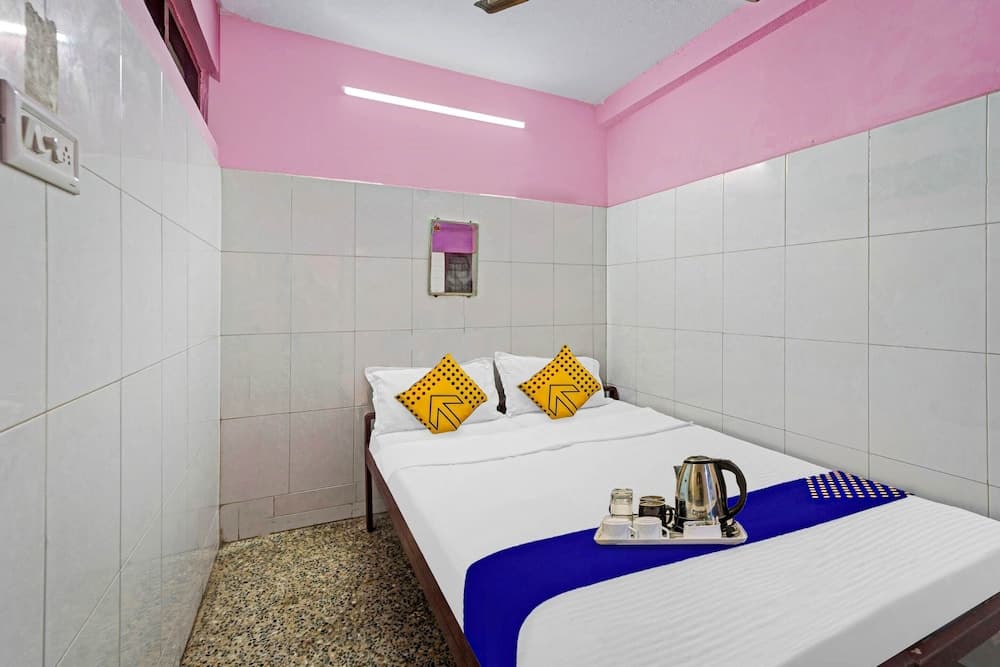 SPOT ON 45468 Kumarans Inn