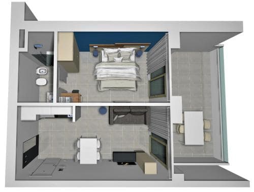A modern studio apartment layout featuring an open-plan living area, cozy bedroom, compact bathroom, and functional kitchenette, ideal for travelers seeking efficient urban accommodation.
