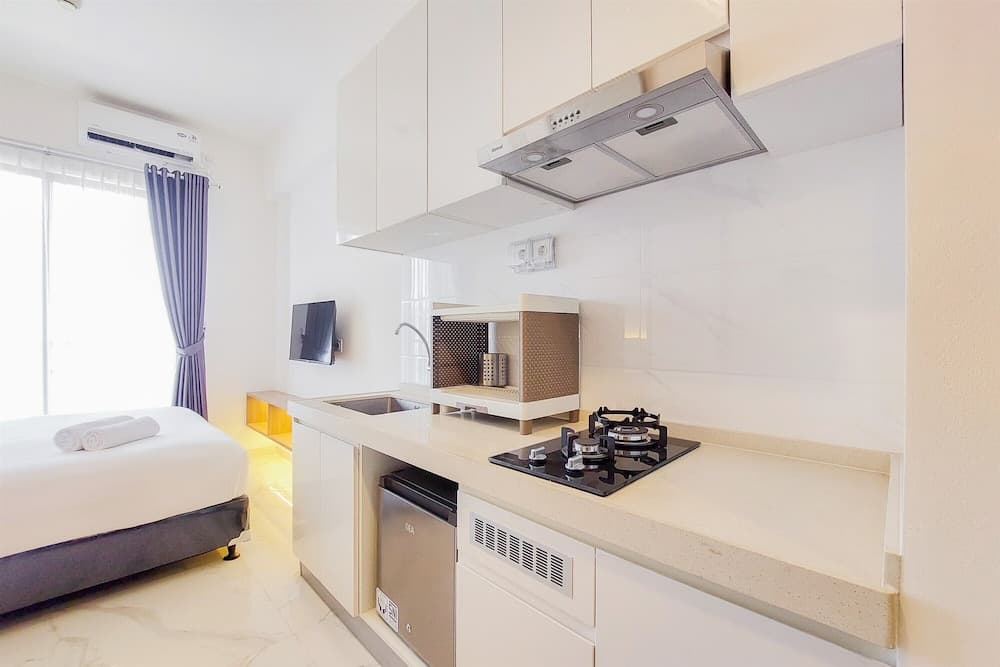 Best and Nice Studio at Sky House BSD Apartment near AEON Mall By Travelio