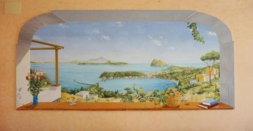 A vibrant mural depicting a serene coastal landscape with lush greenery, quaint houses, and calm waters framed by an arched wall, ideal for travelers seeking inspiration for Mediterranean getaways.