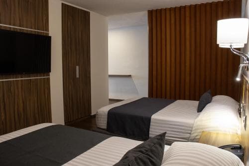 Estanza Hotel & Suites