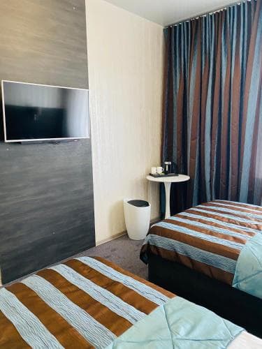 Status Hotel