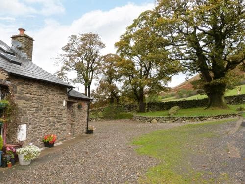 Oak Tree Cottage nestled in the hills of the Lake District and Yorkshire Dales