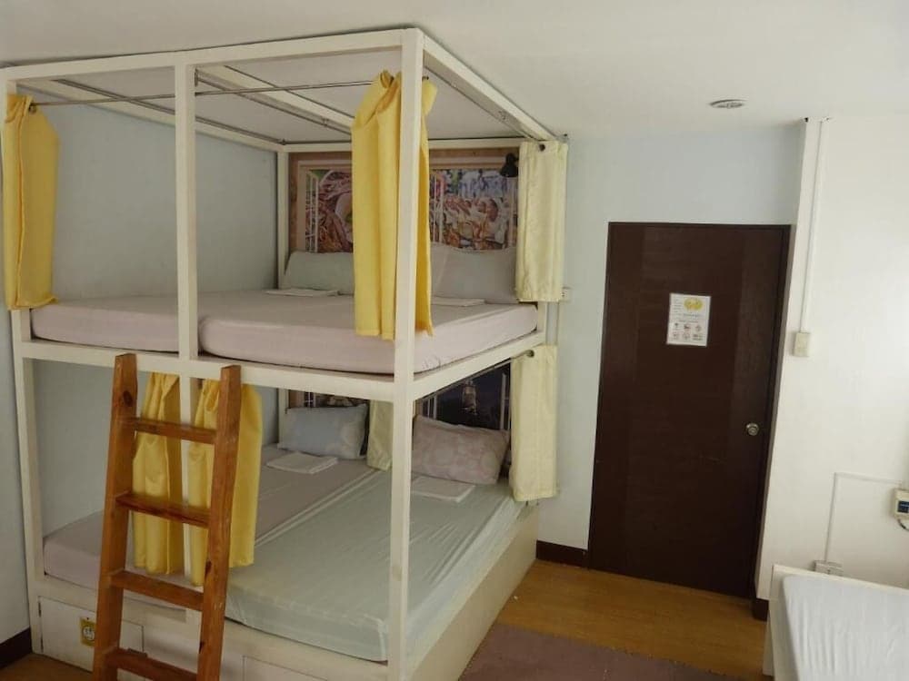 His Capsule Hostel