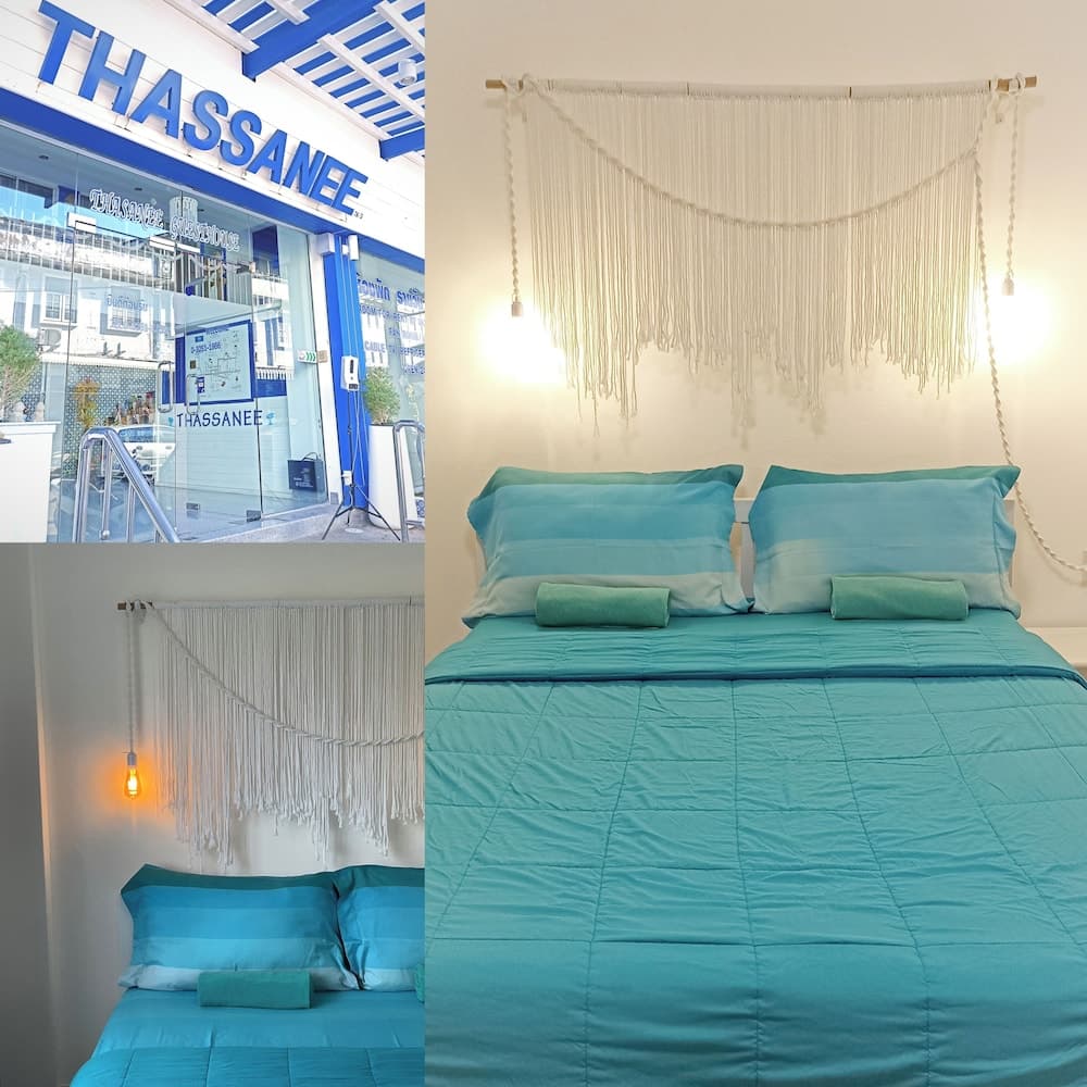 A cozy bedroom with turquoise bedding and a macrame wall hanging exudes a serene vibe, complemented by the inviting entrance of a modern hotel featuring bold blue signage, ideal for travelers seeking comfort and style.