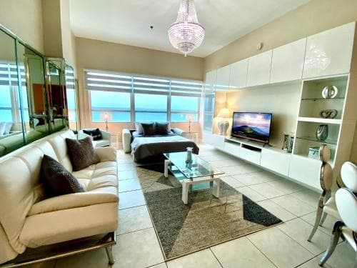 Large luxurious direct ocean front Penthouse or Deluxe one bedroom ocean front condo-free parking-