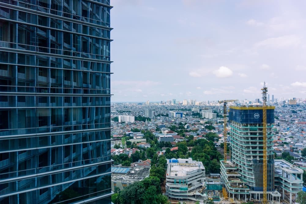 Modern Look and Spacious 1BR at Neo Soho Apartment By Travelio