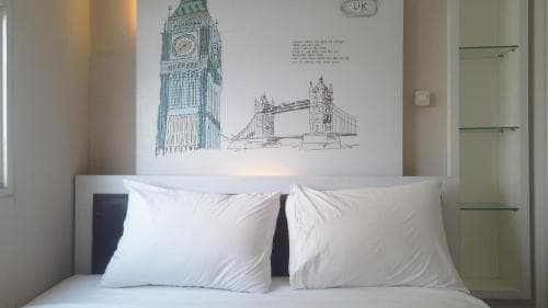 Cozy and Spacious 2BR at Suites @Metro Apartment By Travelio