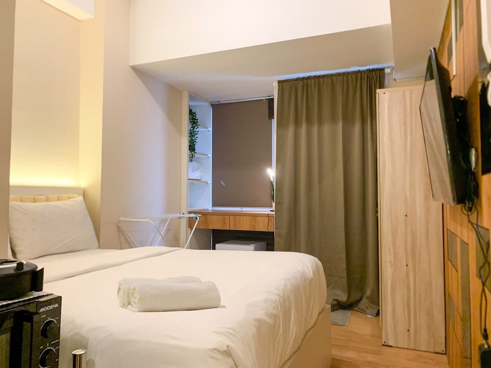 Minimalist and Nice Studio at Tokyo Riverside PIK 2 Apartment By Travelio