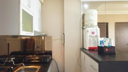 Cozy and Spacious 2BR at Suites @Metro Apartment By Travelio