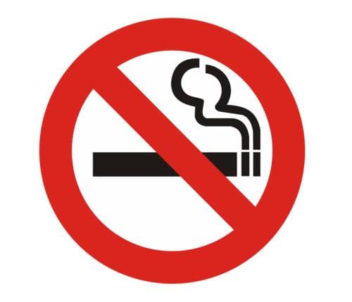 A bold "no smoking" sign with a red circle and slash over a cigarette icon conveys a clear prohibition in public spaces, ideal for travelers seeking smoke-free environments.