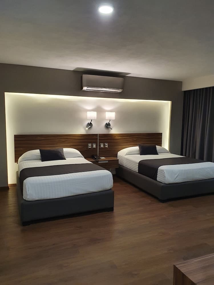 Estanza Hotel & Suites