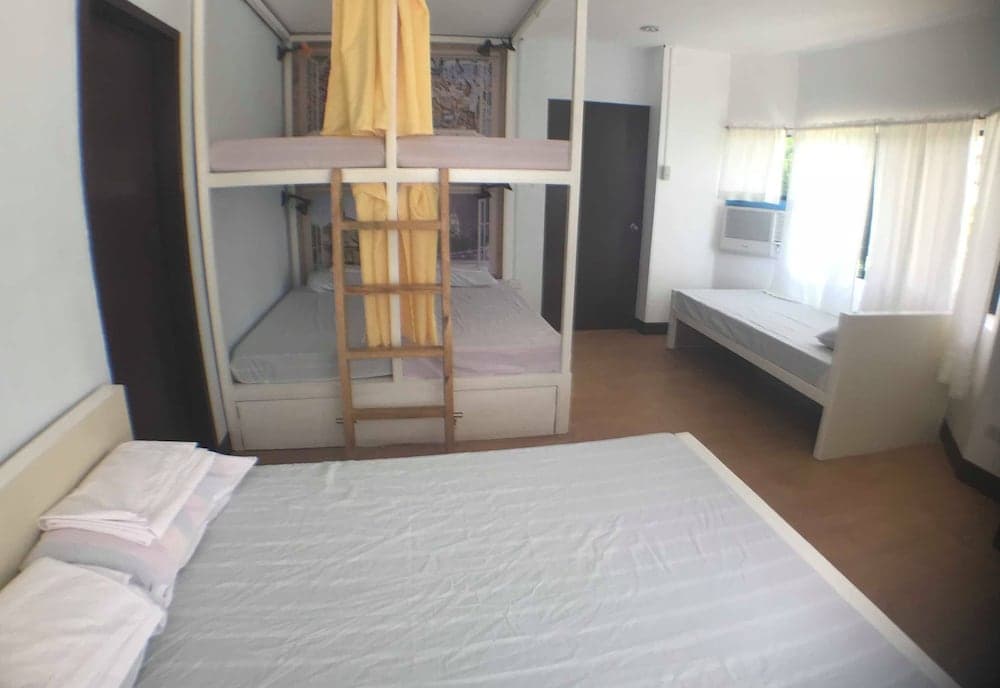 His Capsule Hostel