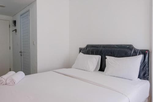 Cozy and Spacious 2BR at Suites @Metro Apartment By Travelio