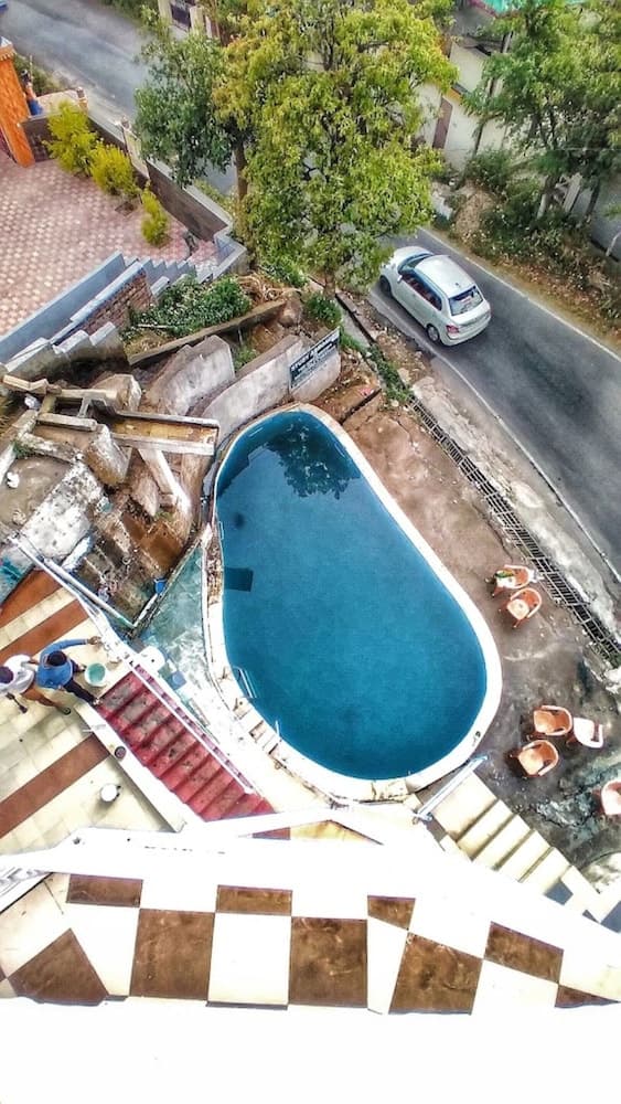 Goroomgo Hotel Aqua Waterfall Dharamsala