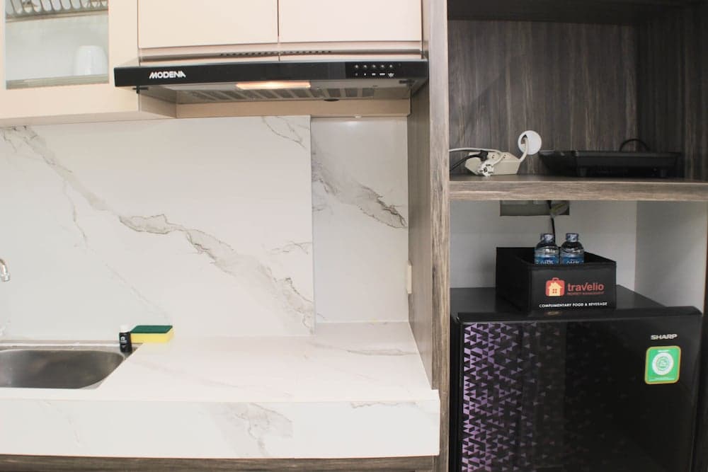 Comfort and Simply Studio Springlake Summarecon Bekasi Apartment By Travelio