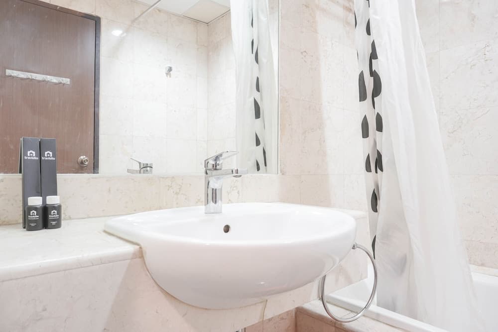 Comfort and Minimalist 3BR Apartment at Bellagio Residence By Travelio