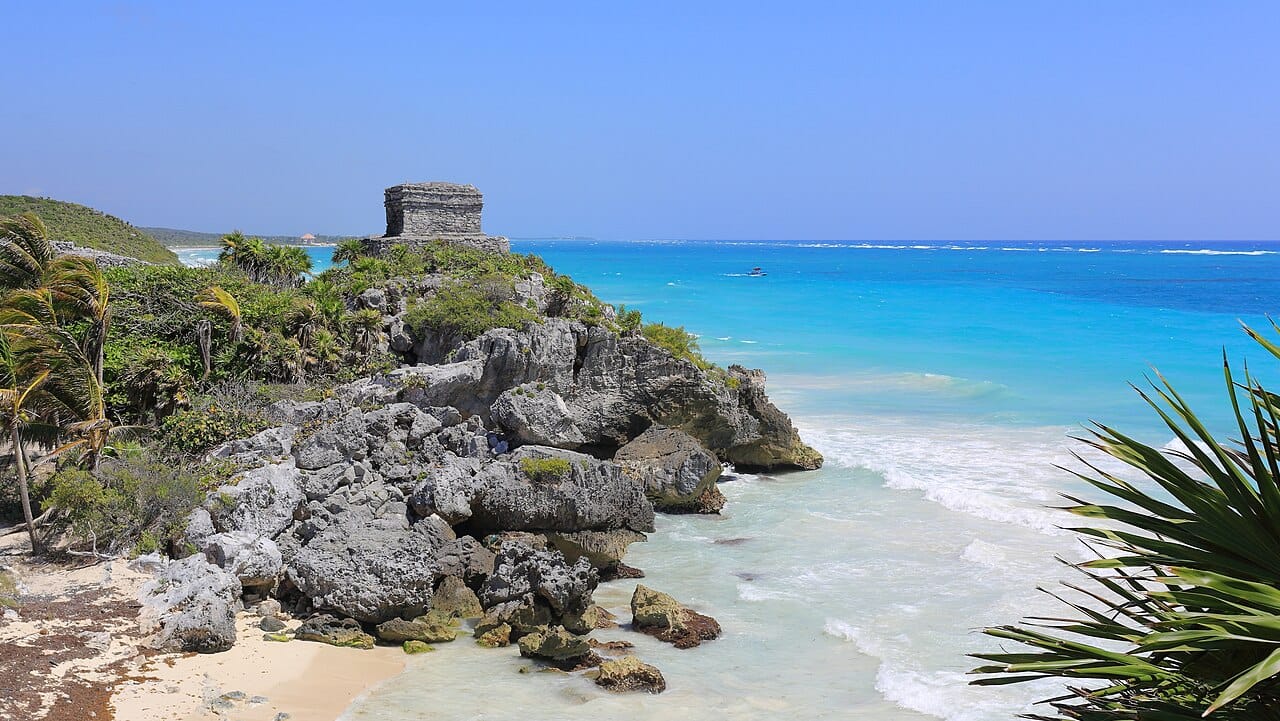 Tulum ruins tickets guide showing the Temple of the Wind above the Caribbean coast